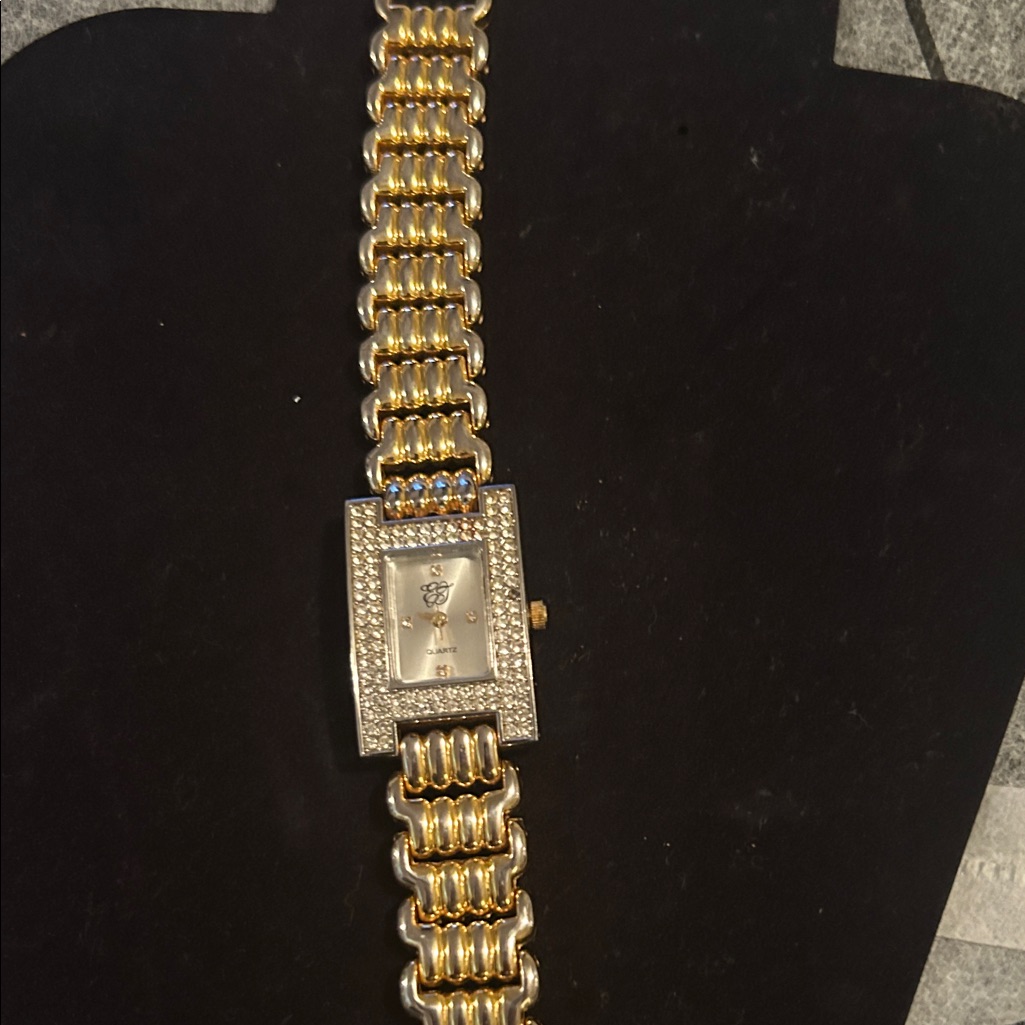 Gold And Silver Watch With Blue Accents